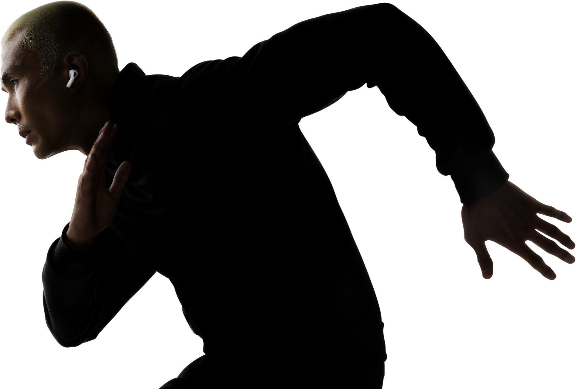 A person running outdoors wearing AirPods Pro 3